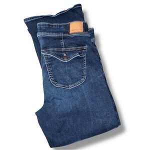 American Eagle Next Level Stretch Low-Rise Kick Bootcut Jean in Dark Rich Indigo